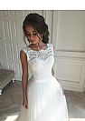 Elegant Puffy Wedding Dress with V-Cut Lace Up